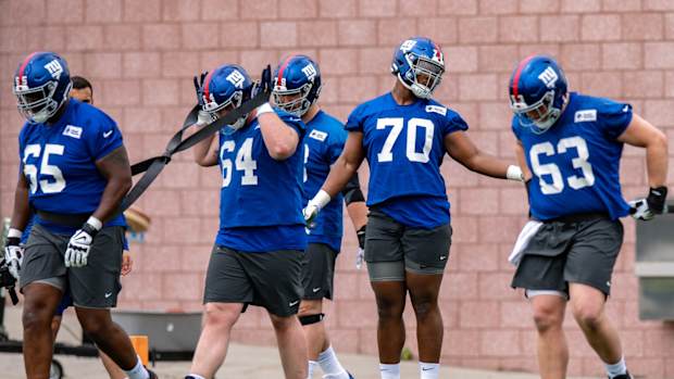 May 2022: Giants offensive linemen go through drills.